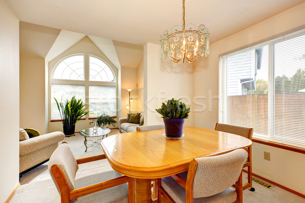 Bright dining area with maple table in luxury house Stock photo © iriana88w