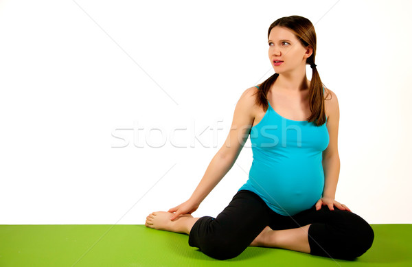 Enceintes jeunes femmes vert tapis de yoga [[stock_photo]] © iriana88w