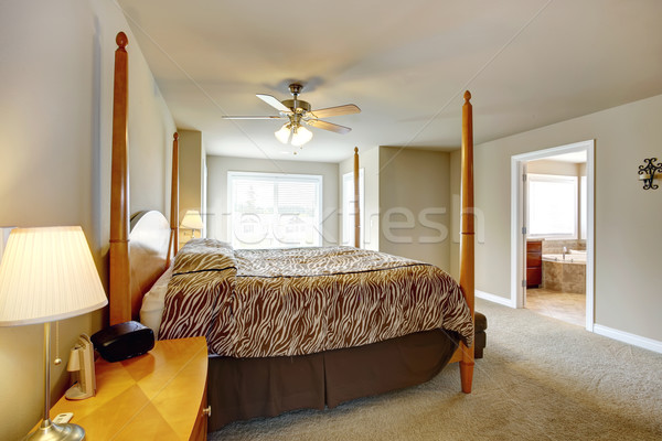 Bedroom interior. Beautiful bed with high posts Stock photo © iriana88w