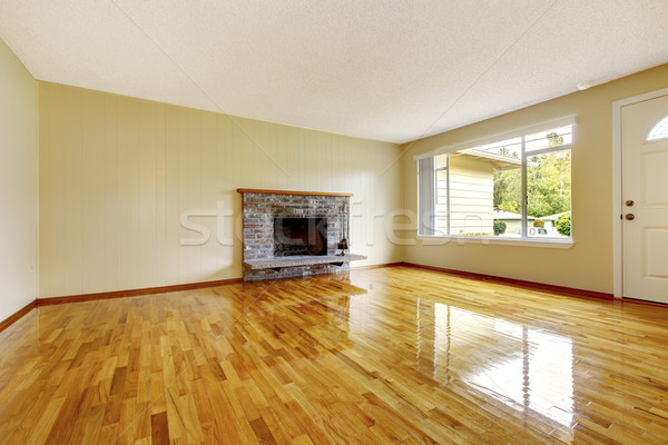 Large empty living room  interior with brick fireplace. Stock photo © iriana88w