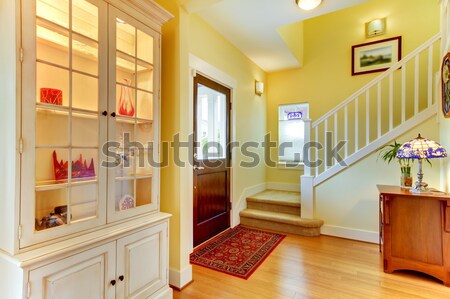 White Kitchen Pantry With Antique Cabinets And Window Stock Photo