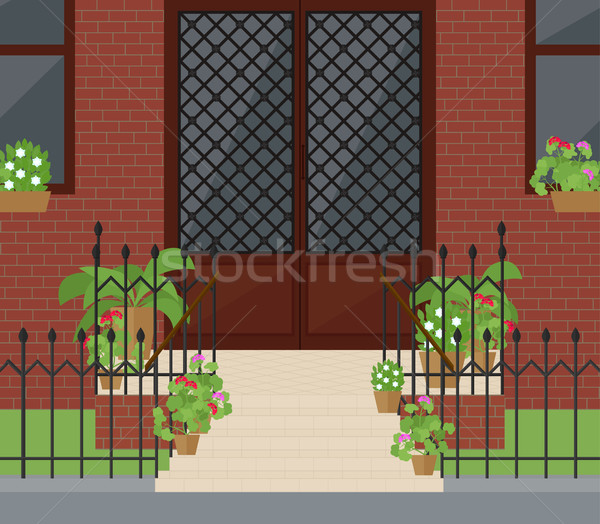 Porte d'entrée escaliers fleurs entrée belle porte Photo stock © Irinka_Spirid