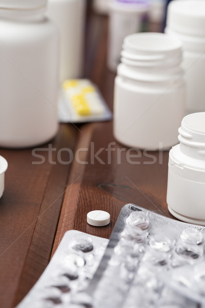 White pill plastic bottle and empty blister pack Stock photo © ironstealth