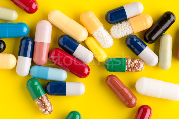 Pills different on color background Stock photo © ironstealth