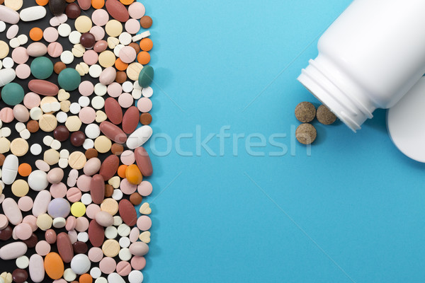 Different pills and bottle with copy space Stock photo © ironstealth