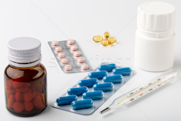 Medical setup of glass and plastic bottles for medicine Stock photo © ironstealth