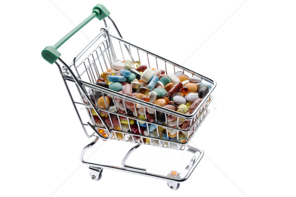 Foto stock: Compras · carrinho · diferente · colorido · pílulas · branco