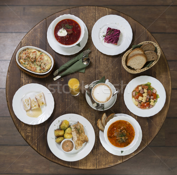 Business lunch on a vintage round table. Tuesday Stock photo © ironstealth