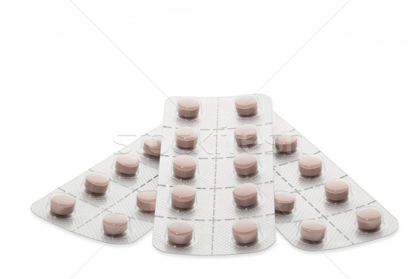 Set of pills in a blister pack on white background Stock photo © ironstealth