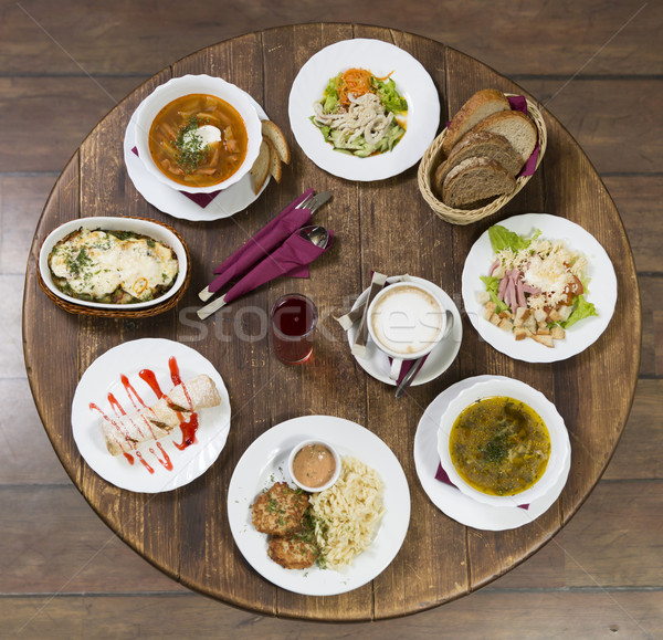Business lunch on a vintage round table. Thursday Stock photo © ironstealth