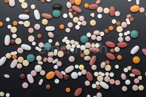 Différent pilules noir beaucoup hôpital boîte Photo stock © ironstealth