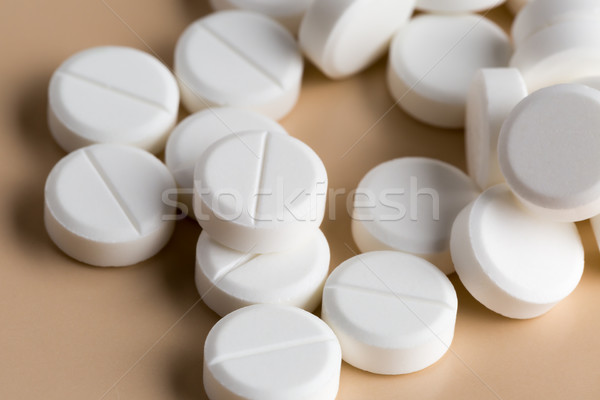 Heap of round white pills Stock photo © ironstealth