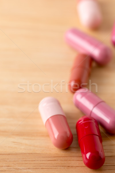 Scattered colorful medicine pills and capsules Stock photo © ironstealth