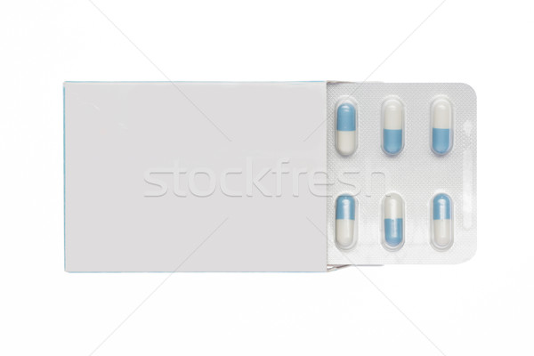 White box with white-blue capsules blister Stock photo © ironstealth