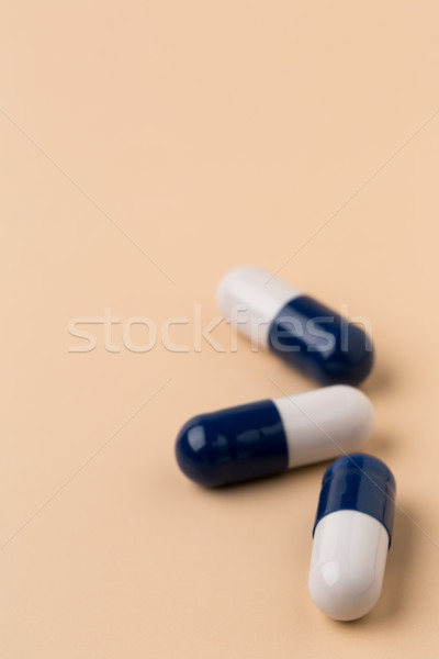 Tres pastillas beige color médicos salud Foto stock © ironstealth