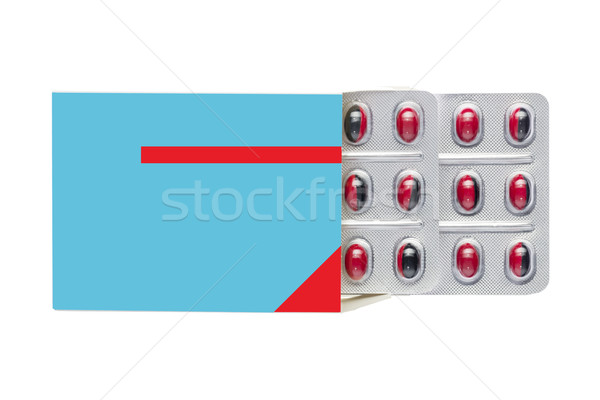 Albastru cutie roşu pastile împacheta Imagine de stoc © ironstealth