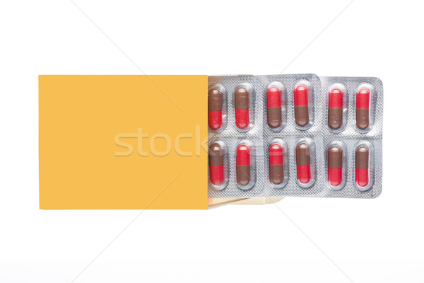 Citromsárga doboz piros tabletták hólyag csomag Stock fotó © ironstealth