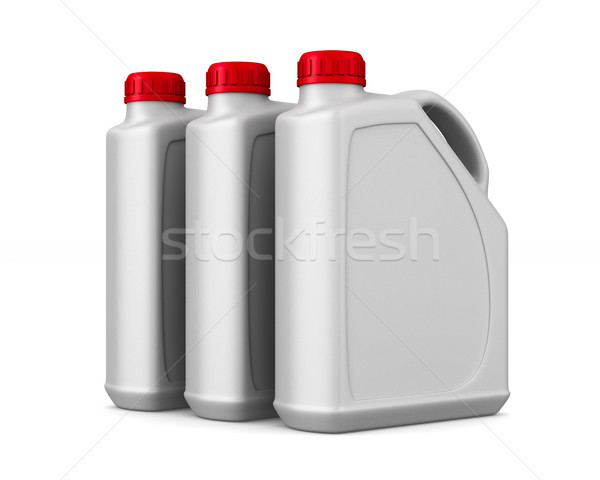 three plastic canisters motor oil on white background. Isolated  Stock photo © ISerg