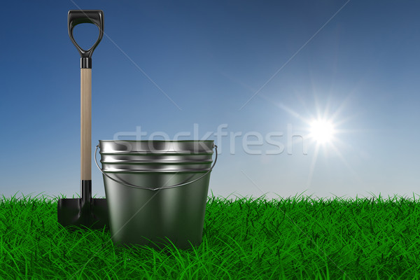 Shovel and bucket on grass. garden tool. 3D image Stock photo © ISerg