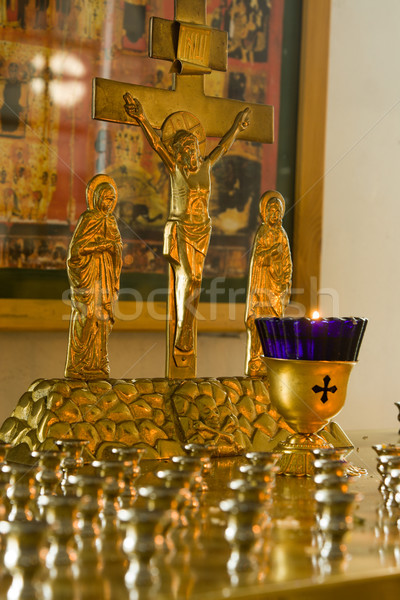 Jesus Christ's crucifixion. A burning candle. Stock photo © ISerg