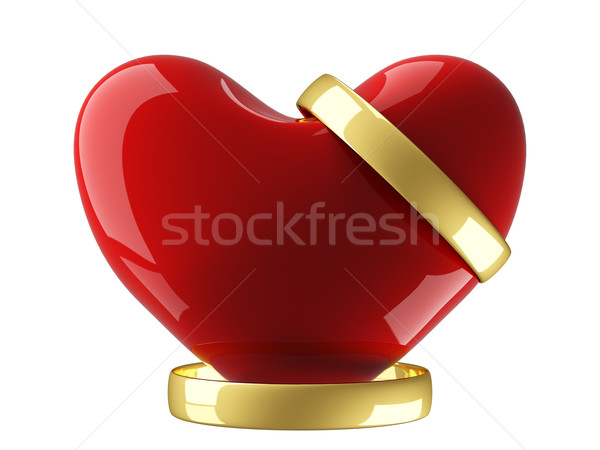 Heart with wedding rings on a white background. 3D image. Stock photo © ISerg