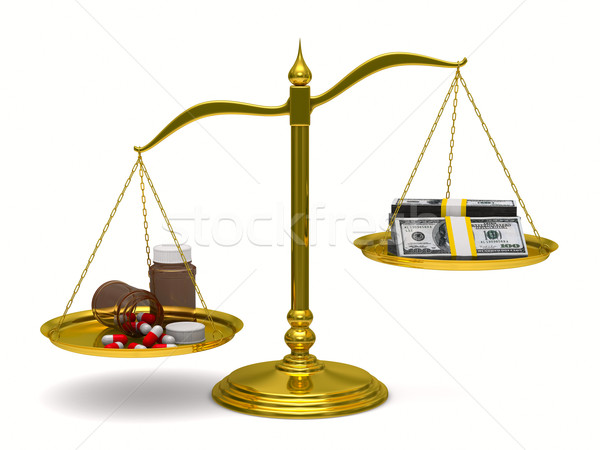 Medicines and money on scales. Isolated 3D image Stock photo © ISerg