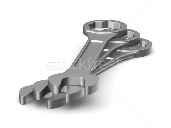 Three spanners on white background. Isolated 3D illustration Stock photo © ISerg