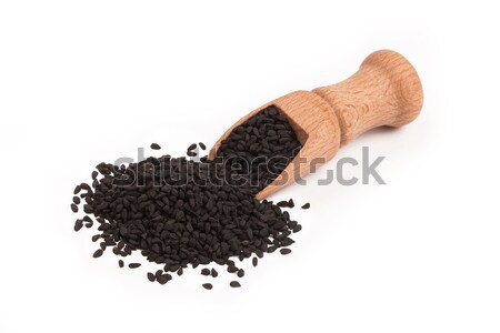 Black cumin seed in wooden scoop isolated on white background. Top view, Nigella sativa Stock photo © ivo_13