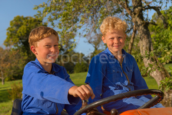 Ferme garçons tracteur équitation orange été [[stock_photo]] © ivonnewierink
