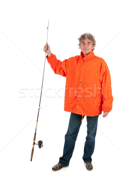 Fisherman with fishing rod Stock photo © ivonnewierink