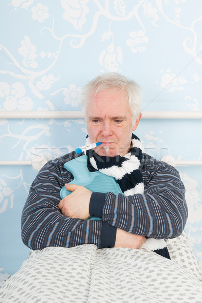 Senior man with flu Stock photo © ivonnewierink