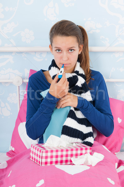 Sick teenager girl Stock photo © ivonnewierink