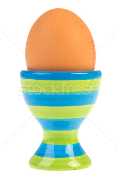 brown egg in egg-cup Stock photo © ivonnewierink