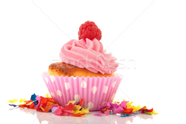 Stock photo: Pink cupcake with raspberry