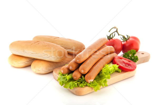 Sausages and bread rolls for hot dogs Stock photo © ivonnewierink