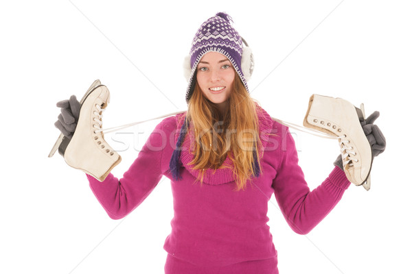 Attractive woman with ice skates Stock photo © ivonnewierink