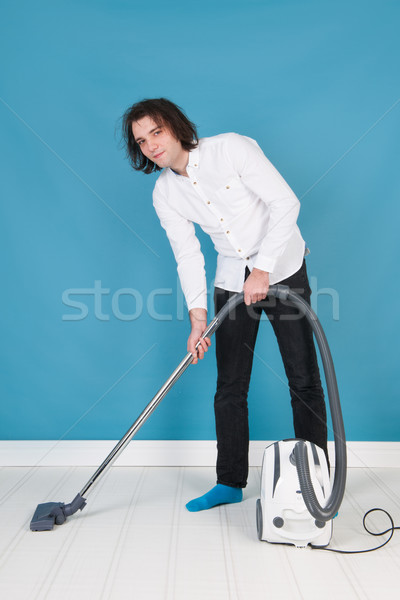 Man with vacuum cleaner Stock photo © ivonnewierink