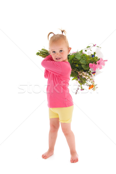 Toddler girl with flowers Stock photo © ivonnewierink