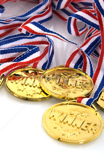 Arany medálok nyertesek siker szalag játék Stock fotó © ivonnewierink