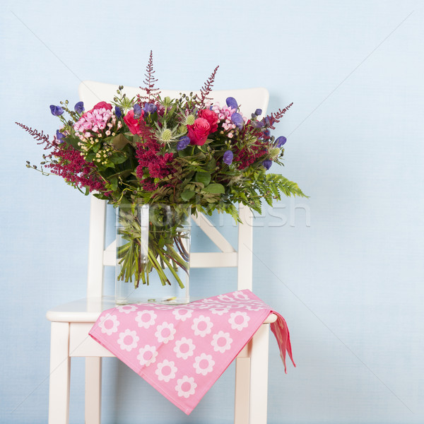 Mixed bouquet flowers on chair Stock photo © ivonnewierink