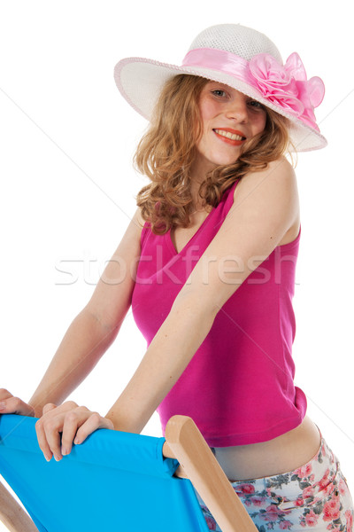 Dziewczyna leżak młoda kobieta różowy niebieski lata Zdjęcia stock © ivonnewierink