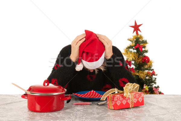 Woman of mature age alone with Christmas Stock photo © ivonnewierink