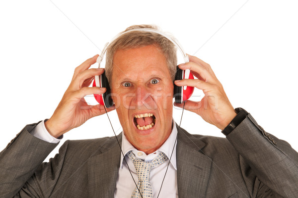 Mad muziek senior man luisteren naar muziek rock Stockfoto © ivonnewierink