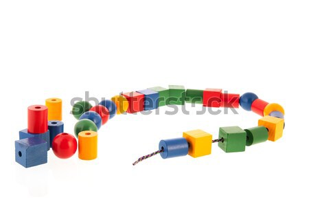 Holzspielzeug Kette Holz Perlen Spielzeug blau Stock foto © ivonnewierink