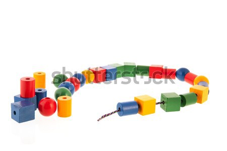 Jouets en bois chaîne bois perles jouet bleu [[stock_photo]] © ivonnewierink