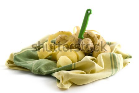 Peeling potatoes Stock photo © ivonnewierink