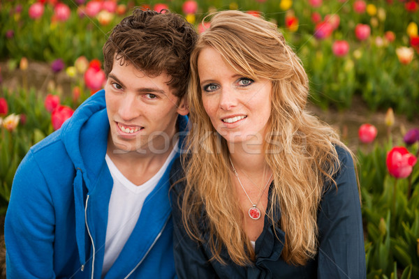 Young couple in Dutch flower fields Stock photo © ivonnewierink