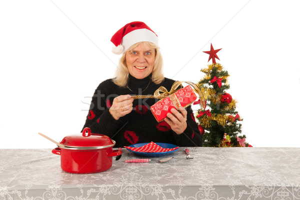 Woman of mature age alone with Christmas Stock photo © ivonnewierink