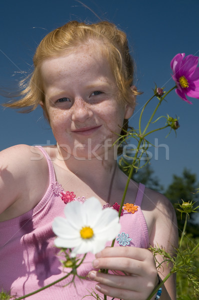 Plucking flowers Stock photo © ivonnewierink