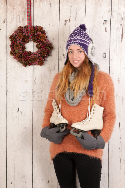 Woman in winter with ice skates Stock photo © ivonnewierink